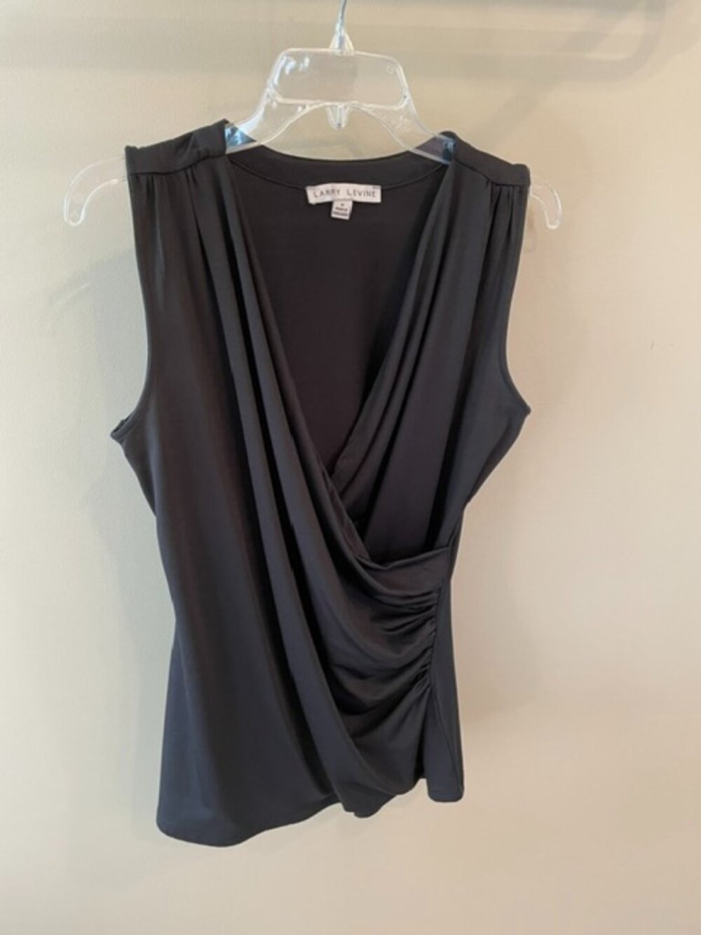 Women's Larry Levine Sleeveless top with crossover front, size medium.